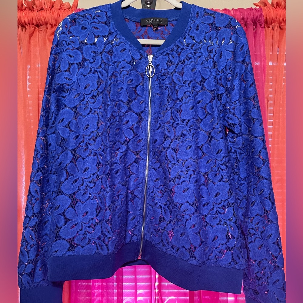 Long sleeve, royal blue, sliver zip up jacket.